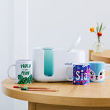 Image of Cricut mugpress and completed mugs