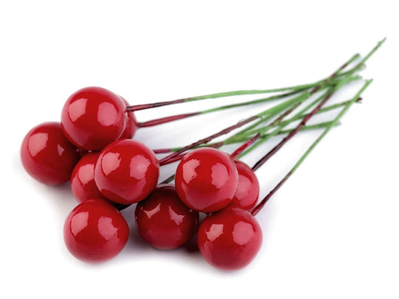 Red rowan berries on wire stem