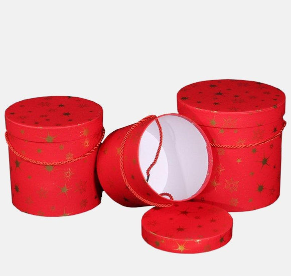 Set of three nesting gift boxes red with gold stars