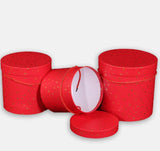 Set of three nesting gift boxes red with small gold stars